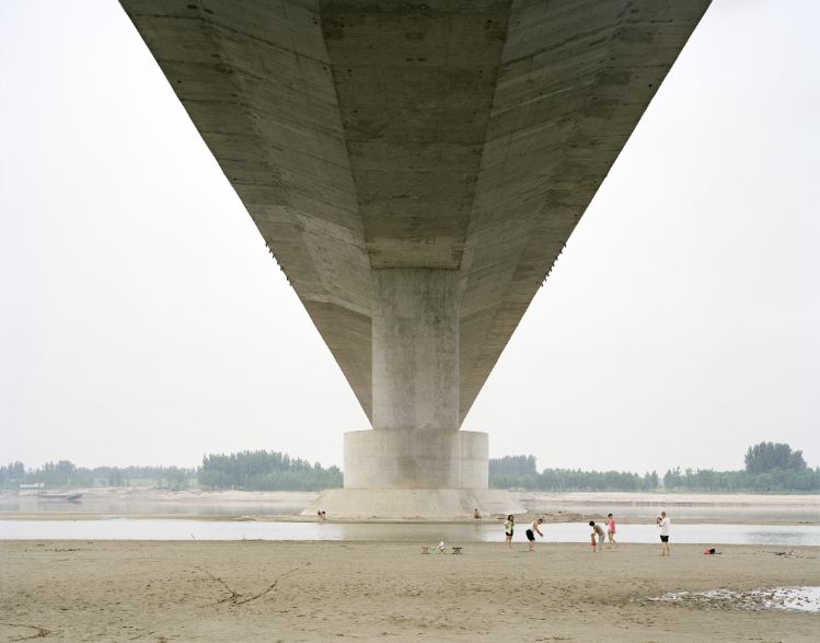 A Family Spending the Weekend under a Bridge, Shandong, China, Zhang Kechun