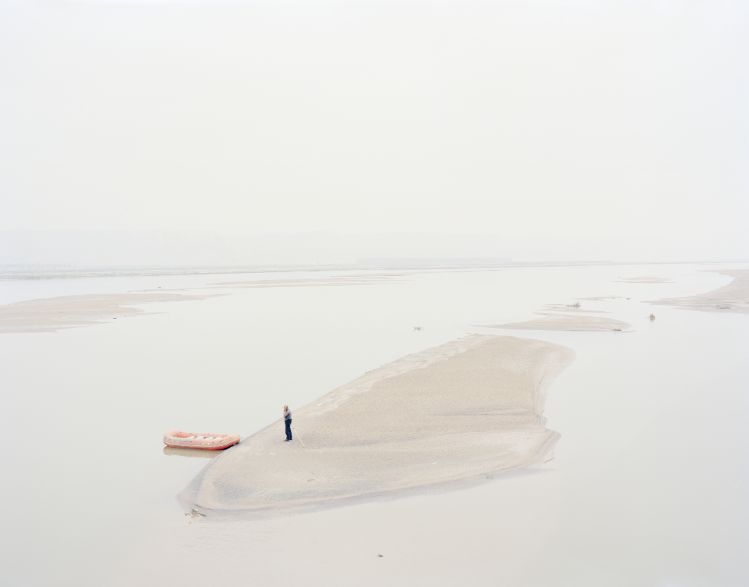 A Man Standing on an Island in the Middle of the River Shaanxi, China, Zhang Kechun