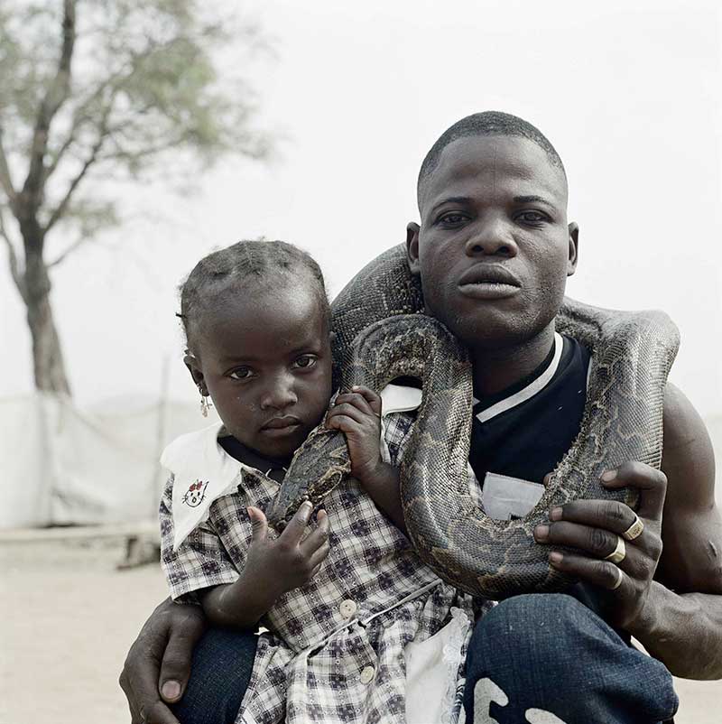 Mummy Ahmadu and a Snake Charmer with a Rock Python, Abuja, Nigeria, Pieter Hugo
