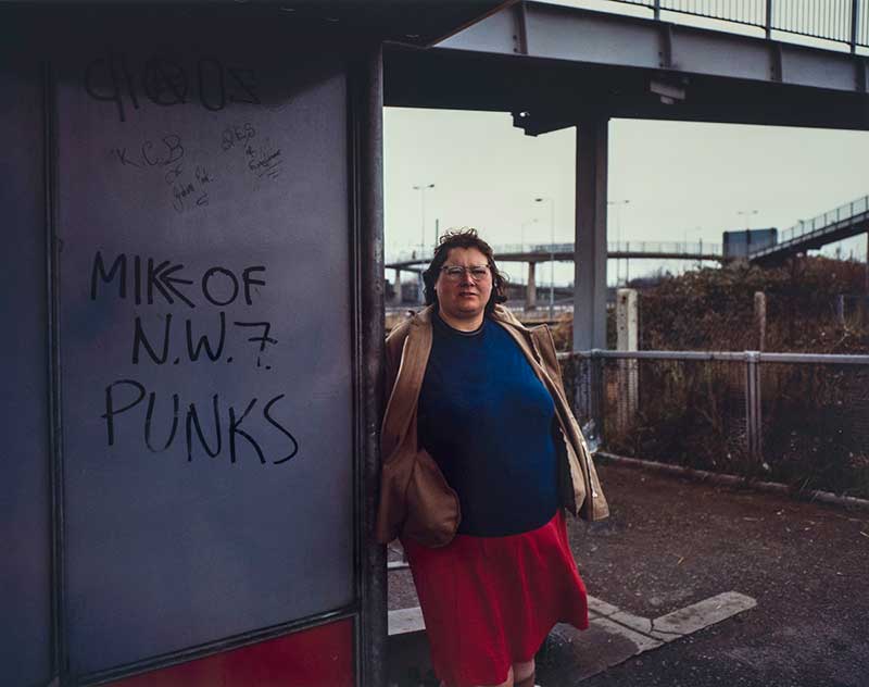 Woman at Bus Stop, Mill Hill, North London, Paul Graham