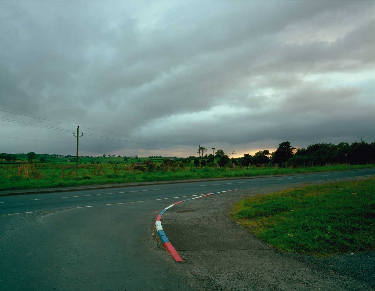 Paul Graham, Unionist Kerbs at Dusk, Troubled Land at Huxley-Parlour, 23.01.25 - 01.03.25