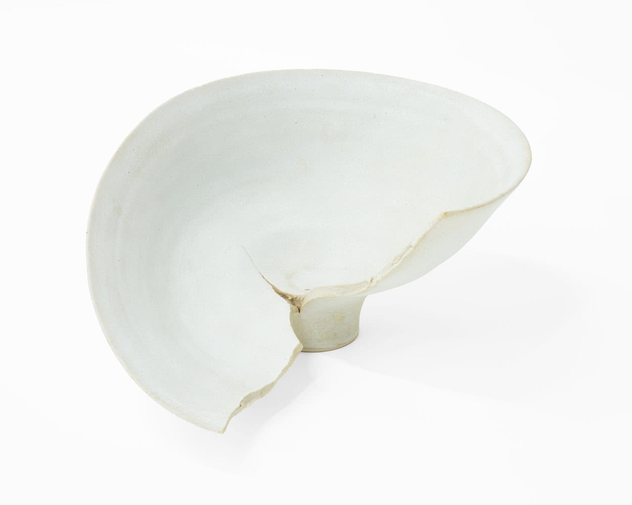 Lucie Rie, White Porcelain Bowl Split in Firing, c. 1978, Huxley-Parlour, 25.04–31.05.25