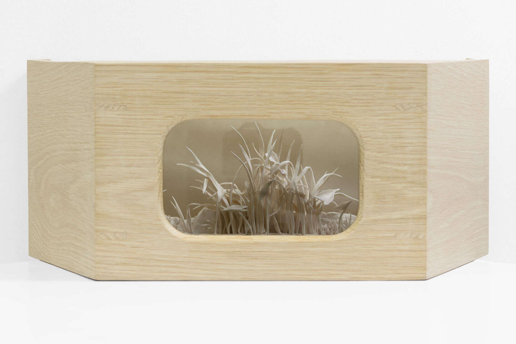 Katie Spragg, Wild Swim, 2020, Glazed porcelain, bleached oak, paper, 19 x 7 1_2 x 8 inches, Huxley-Parlour