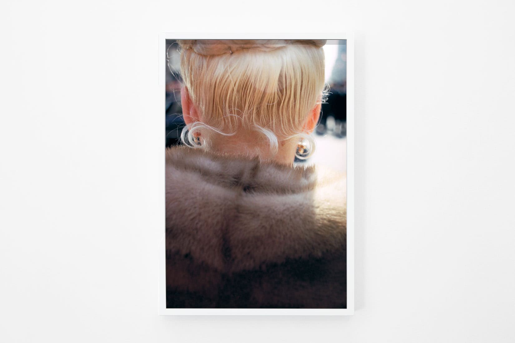 Photo of the back of a womans neck.