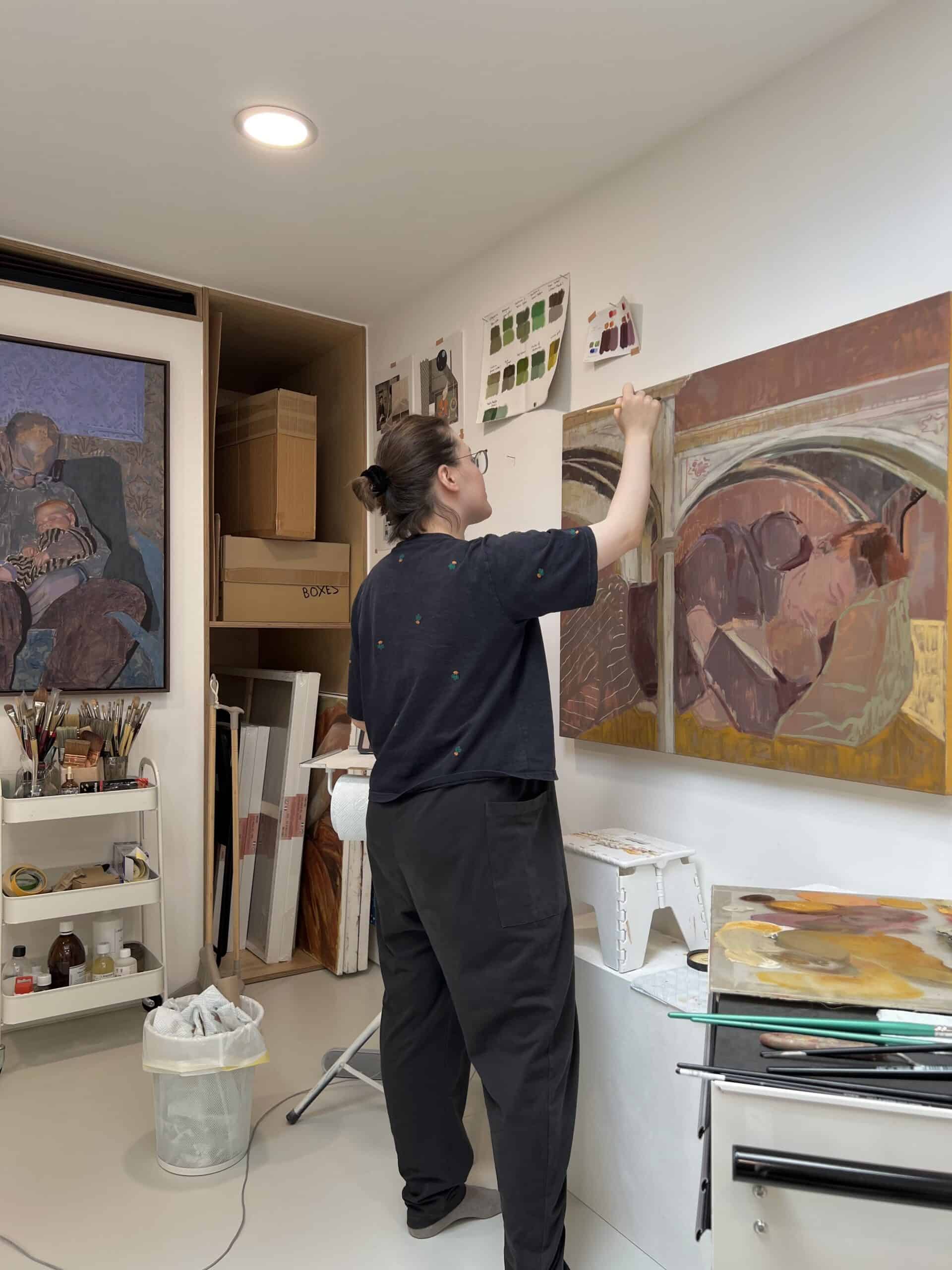 Kayoon Anderson painting in her studio