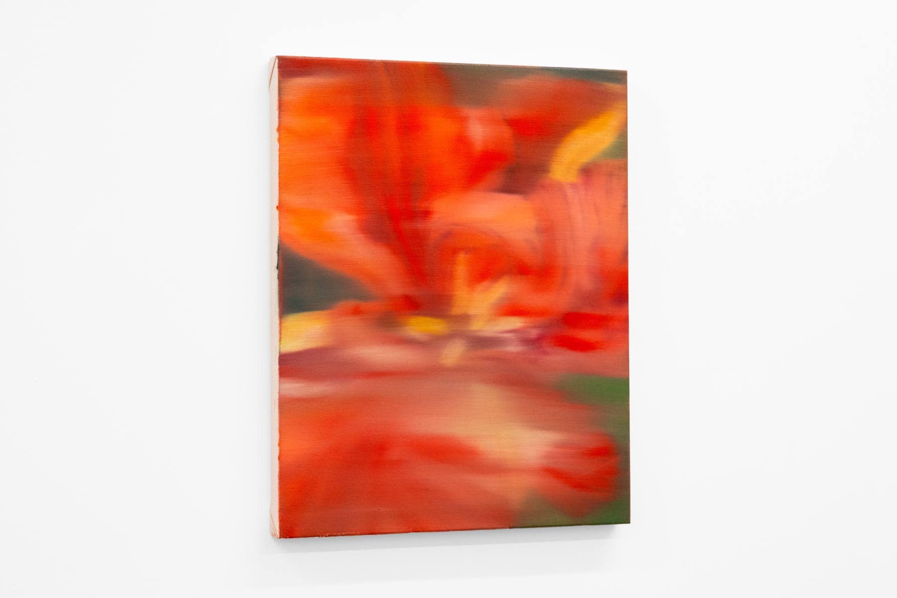 Painting of a flower in warm red and orange tones.