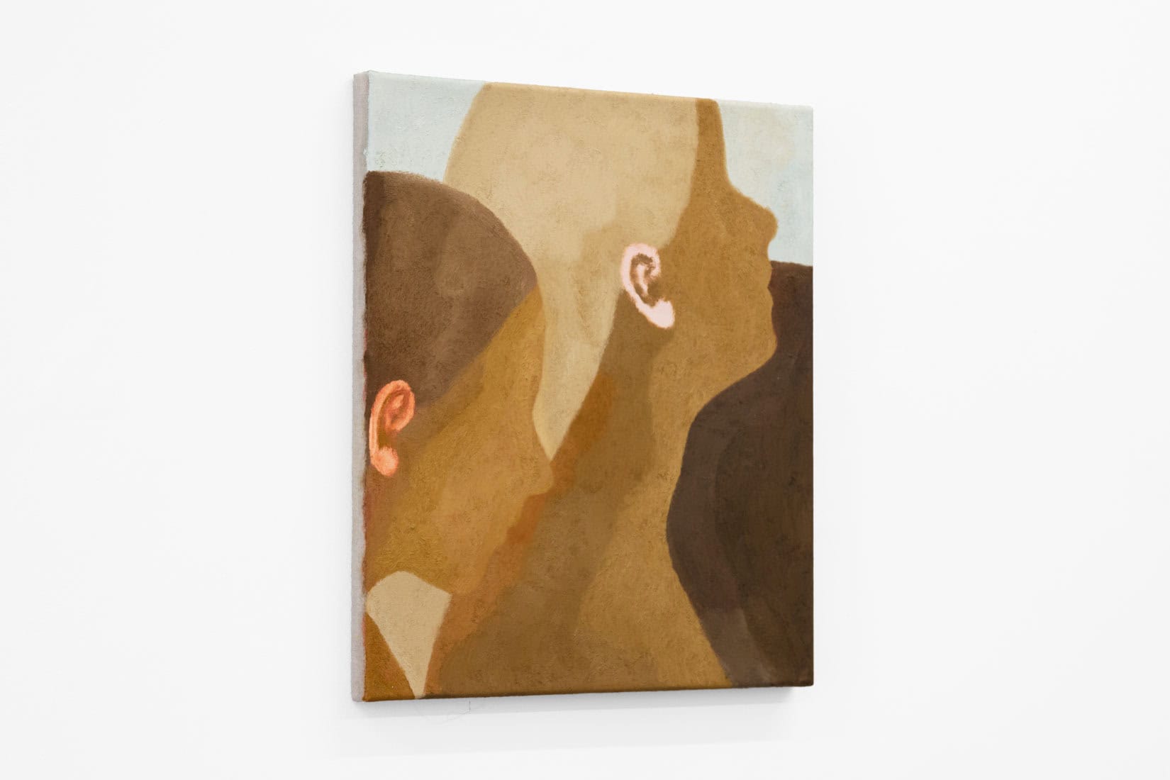 Abstracted painting of two women's side profiles in blue and brown.