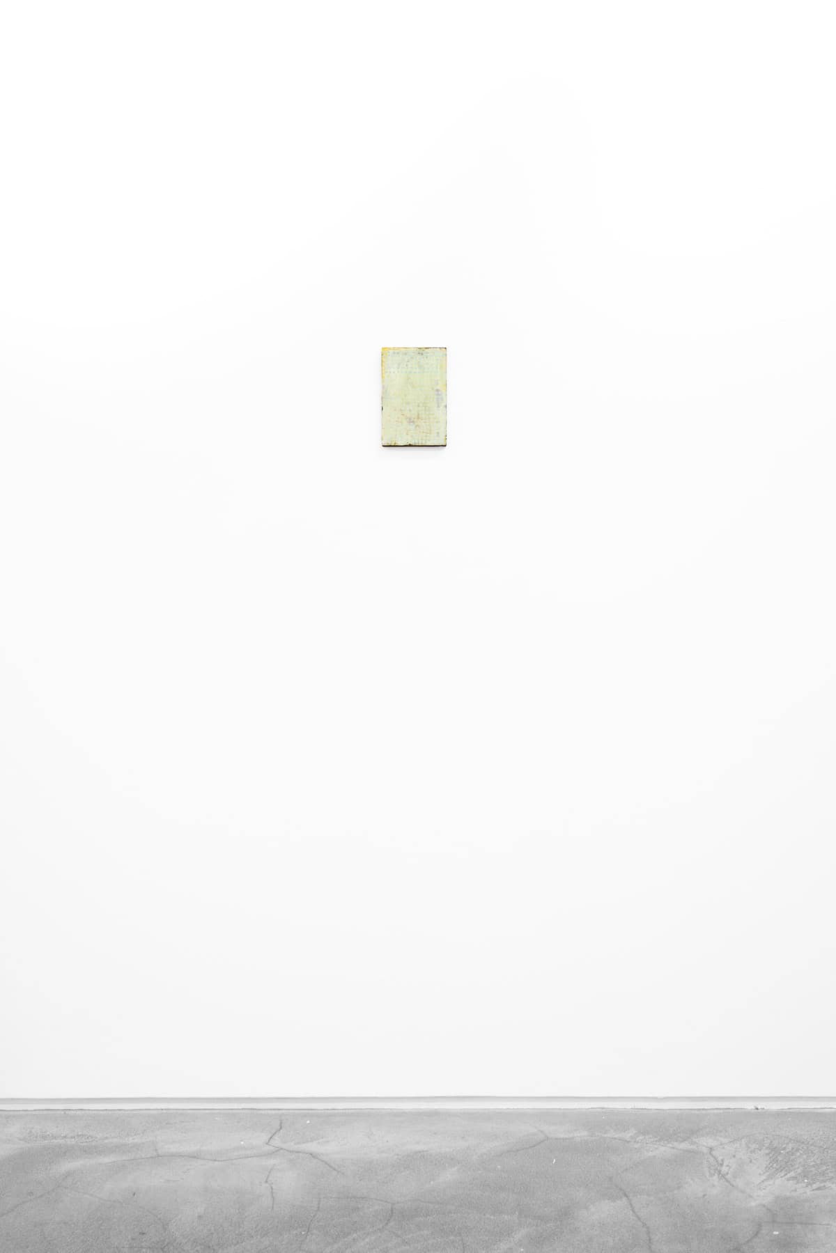 Abstract painting of green and blue on paper and wood.