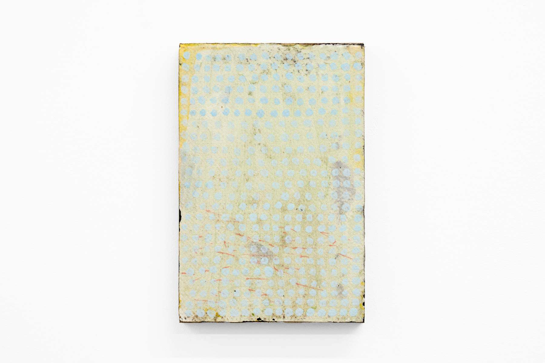 Abstract painting of green and blue on paper and wood.