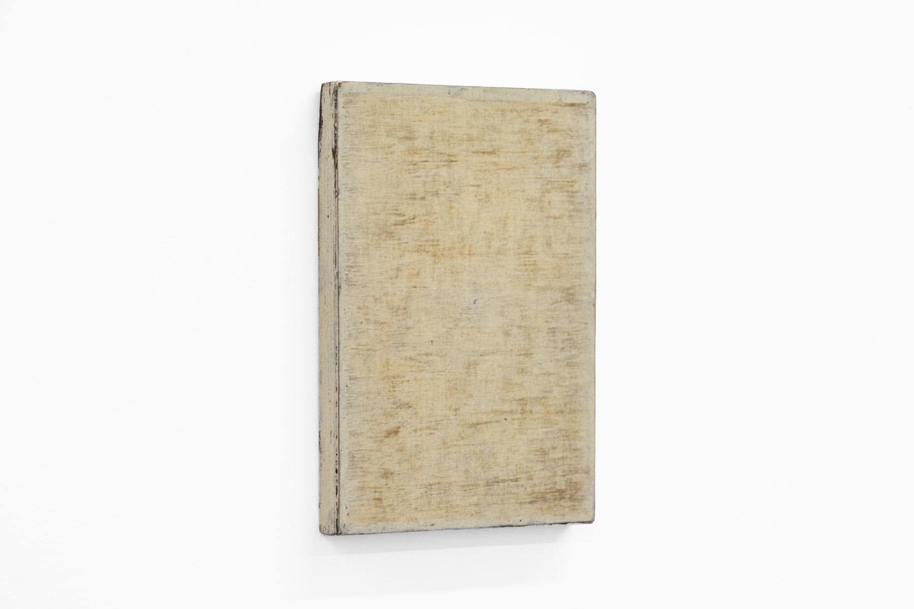 Abstract painting of neutral colours on paper and wood.