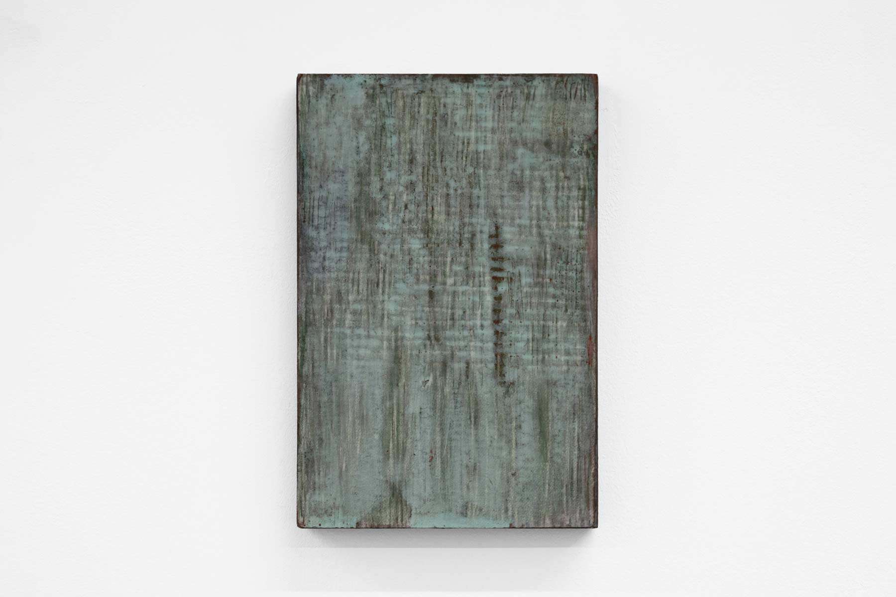Abstract painting of green and blue on paper and wood.