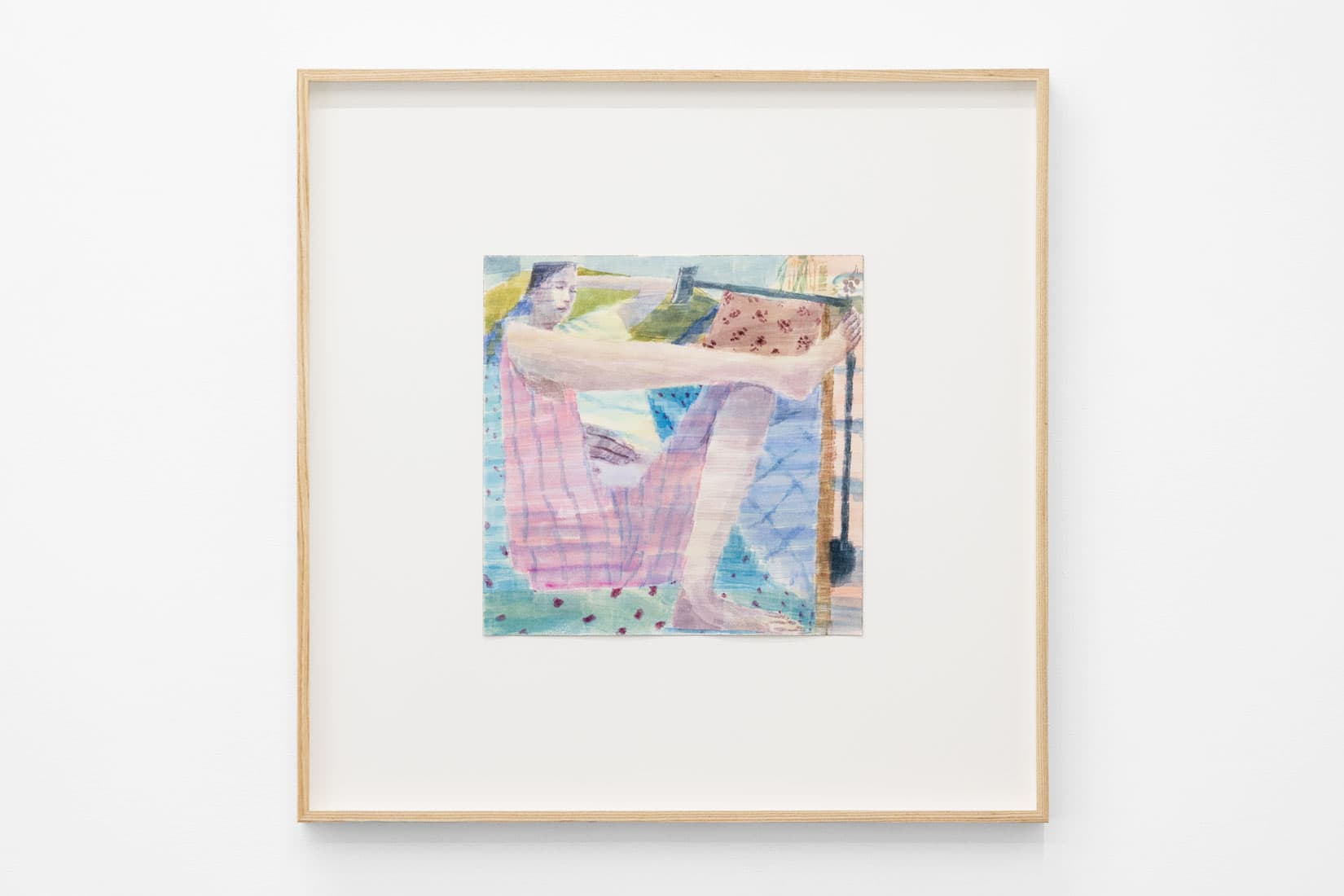Watercolour painting of a person laying on a couch looking at a phone on a stand.