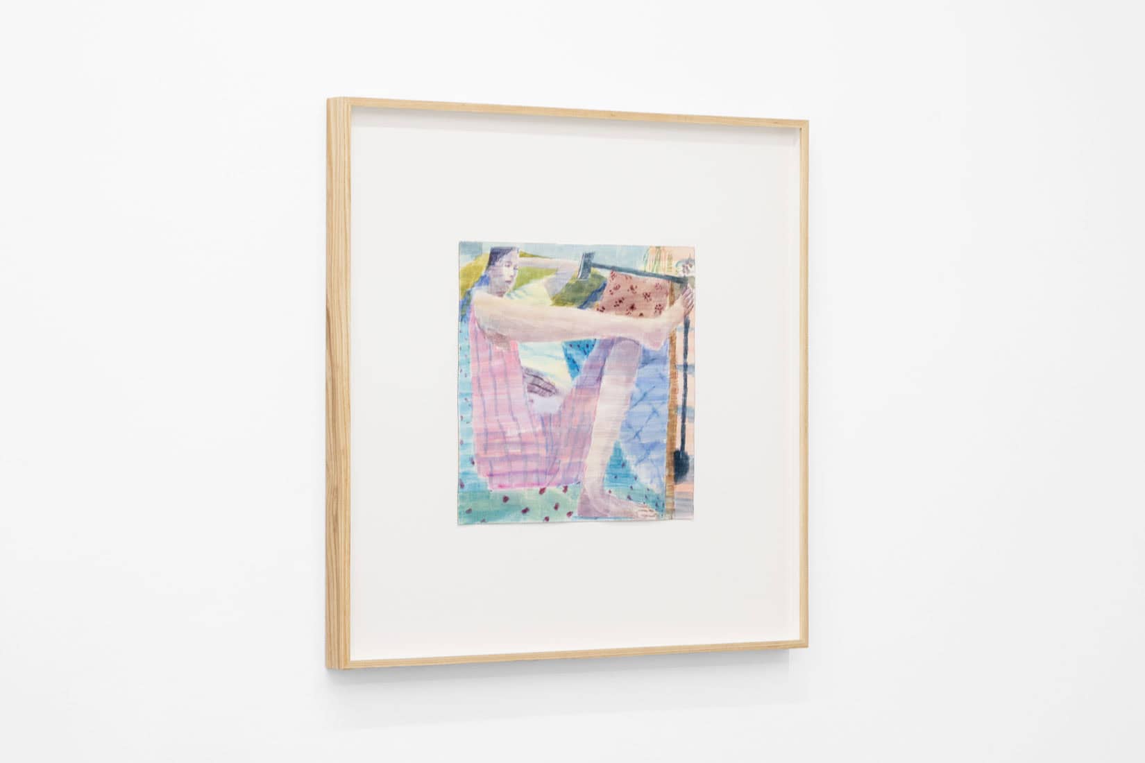 Watercolour painting of a person laying on a couch looking at a phone on a stand.